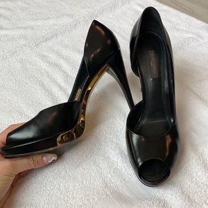 Louis Vuitton black and gold heel